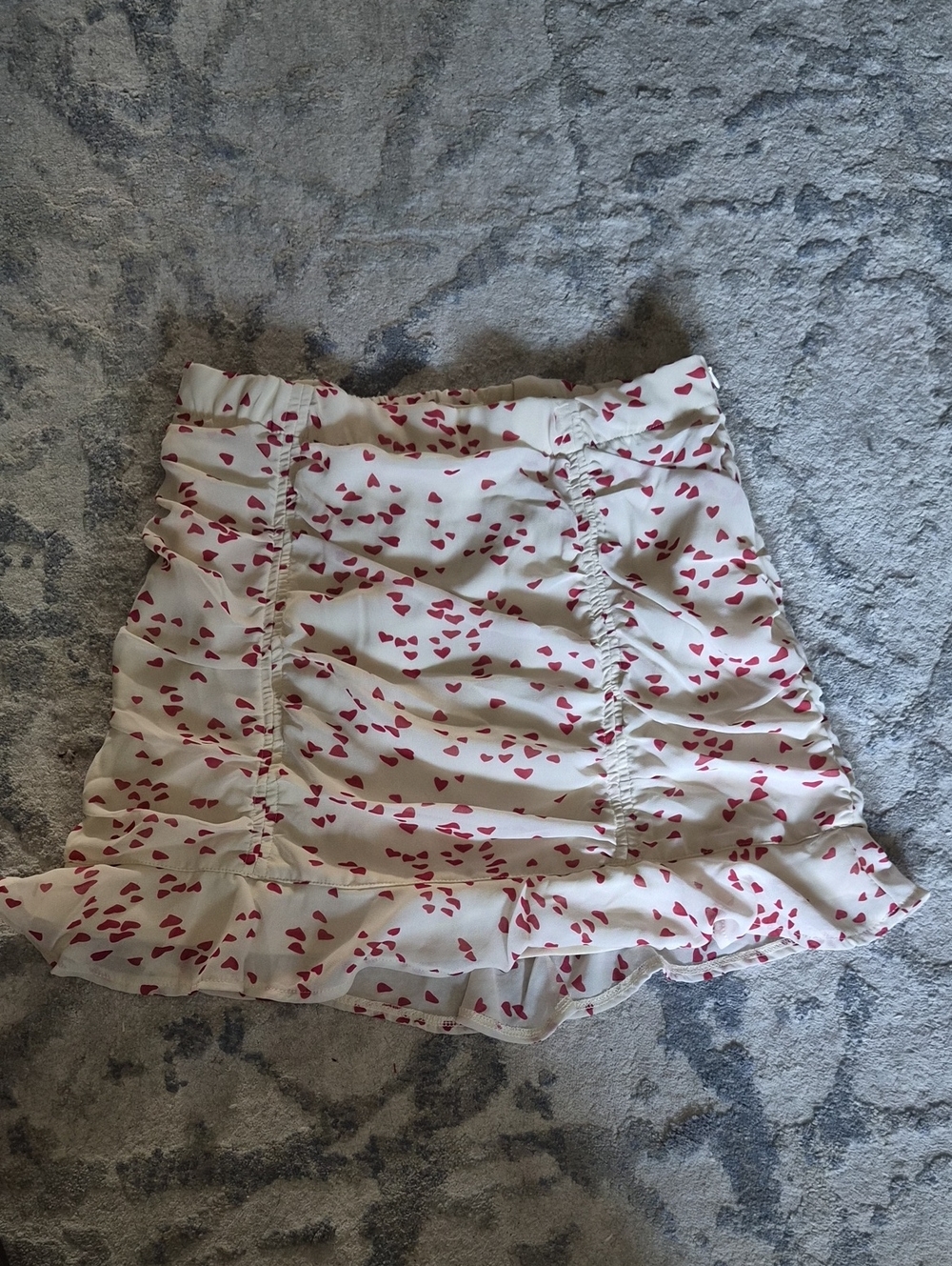 White Mini Skirt with Pink Heart Print and Ruffle Hem
